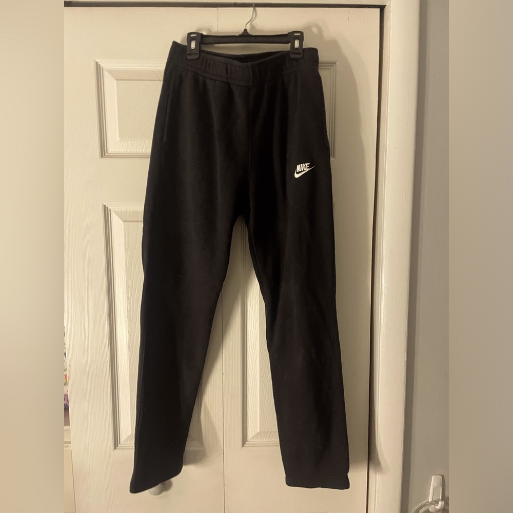 These are black Nike sweat pants